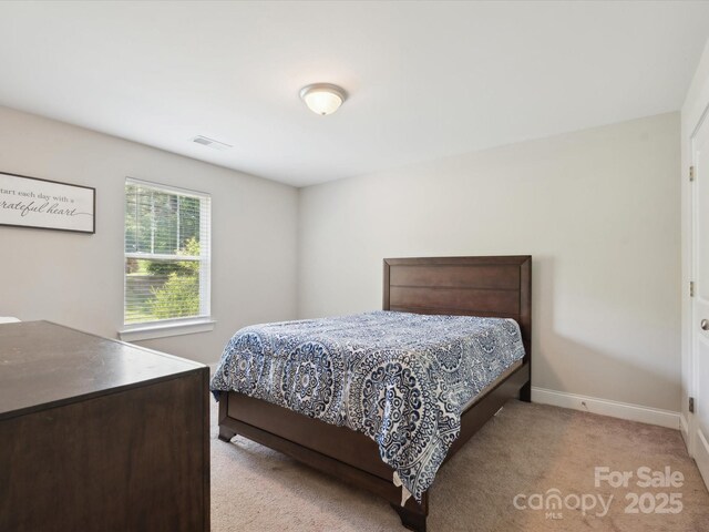 429 Summer Ridge Dr, Stanley, NC 28164 - carpeted bedroom with baseboards
