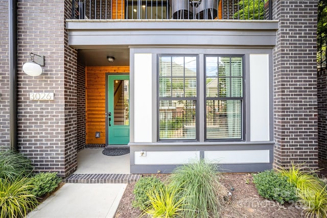 3026 Kalex Ct, Charlotte, NC 28204 - property entrance featuring brick siding and a balcony