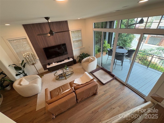 3026 Kalex Ct, Charlotte, NC 28204 - living area with wood finished floors, ceiling fan, and recessed lighting