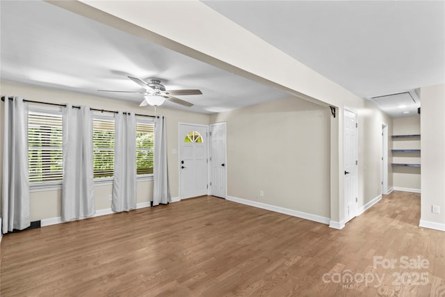 2229 Old Wilkesboro Rd, Statesville, NC 28625 - foyer featuring a ceiling fan, baseboards, and wood finished floors