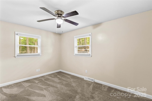2229 Old Wilkesboro Rd, Statesville, NC 28625 - carpeted empty room with baseboards and ceiling fan