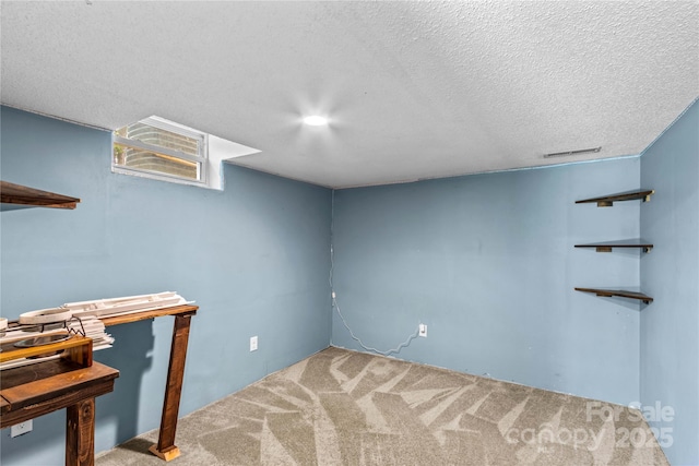 2229 Old Wilkesboro Rd, Statesville, NC 28625 - finished basement with carpet flooring and a textured ceiling