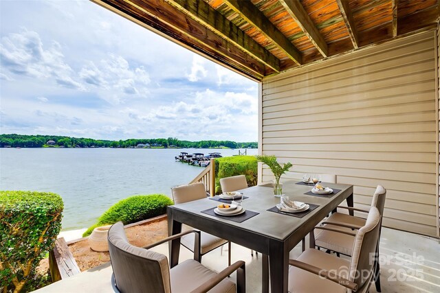 14053 Queens Harbor Rd, Charlotte, NC 28278 - view of patio with outdoor dining space and a water view