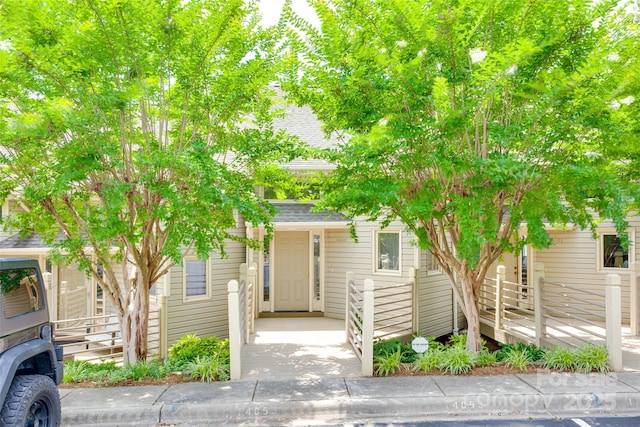 14053 Queens Harbor Rd, Charlotte, NC 28278 - view of property hidden behind natural elements featuring a shingled roof