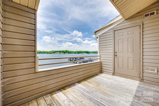 14053 Queens Harbor Rd, Charlotte, NC 28278 - wooden deck featuring a water view