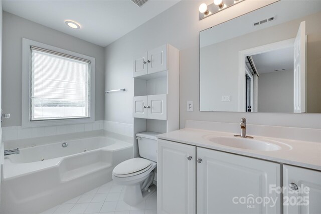 14053 Queens Harbor Rd, Charlotte, NC 28278 - bathroom featuring vanity, tile patterned flooring, and a tub with jets