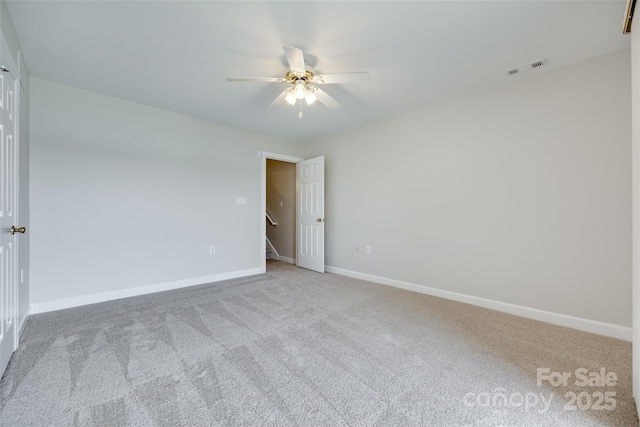 14053 Queens Harbor Rd, Charlotte, NC 28278 - unfurnished room with a ceiling fan and carpet flooring