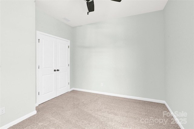 3207 Selwyn Landing Dr, Charlotte, NC 28215 - unfurnished bedroom featuring carpet floors, ceiling fan, and a closet