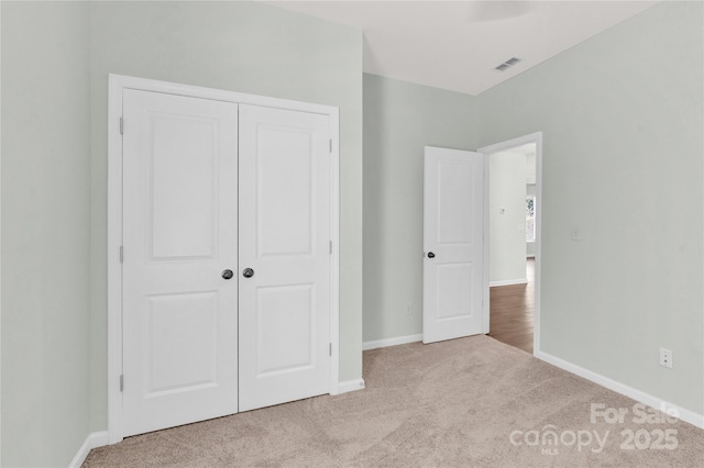 3207 Selwyn Landing Dr, Charlotte, NC 28215 - unfurnished bedroom with carpet flooring and a closet