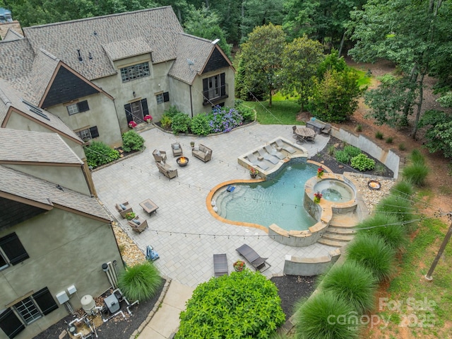 3587 Ridgetop Rd, Sherrills Ford, NC 28673 - view of pool with a patio area, a pool with connected hot tub, and an outdoor fire pit