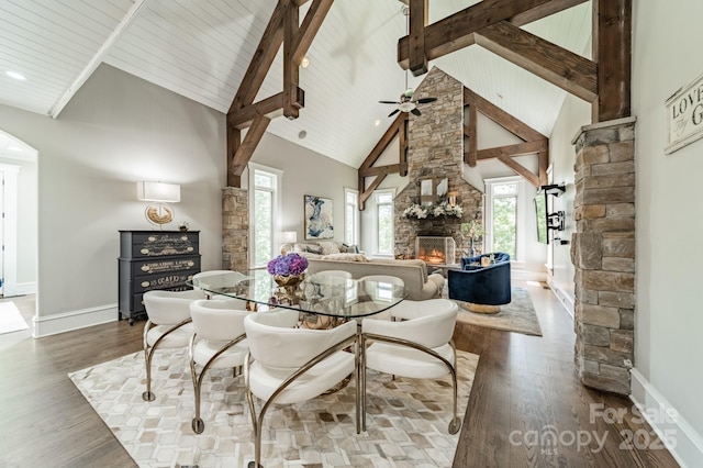 3587 Ridgetop Rd, Sherrills Ford, NC 28673 - dining room featuring a stone fireplace, high vaulted ceiling, plenty of natural light, wood finished floors, and ceiling fan