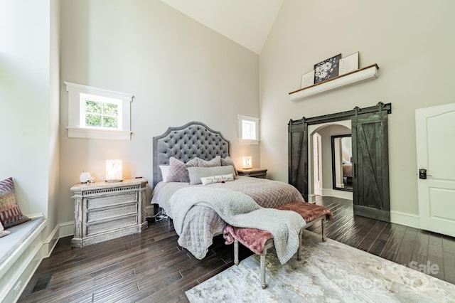3587 Ridgetop Rd, Sherrills Ford, NC 28673 - bedroom with a barn door, high vaulted ceiling, and dark wood finished floors