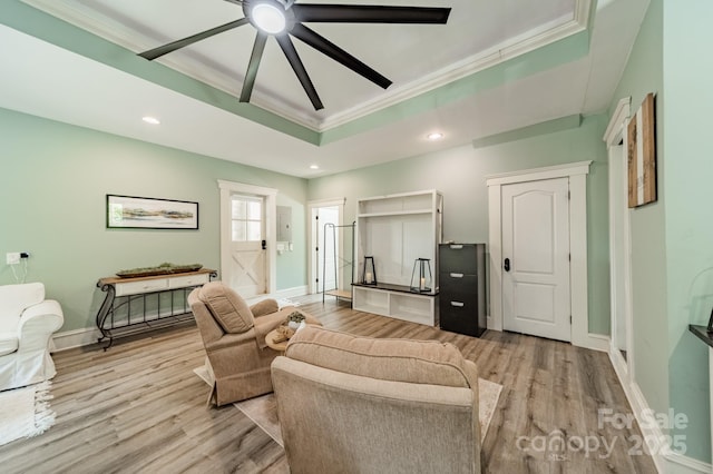3587 Ridgetop Rd, Sherrills Ford, NC 28673 - living area featuring ornamental molding, light wood-style flooring, ceiling fan, a tray ceiling, and recessed lighting