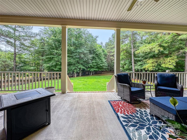 106 Pier Point Dr, Stony Point, NC 28678 - wooden deck featuring outdoor lounge area, view of wooded area, and a fenced backyard