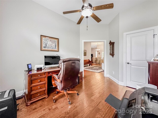 106 Pier Point Dr, Stony Point, NC 28678 - office with a ceiling fan, light wood-style flooring, and a chandelier