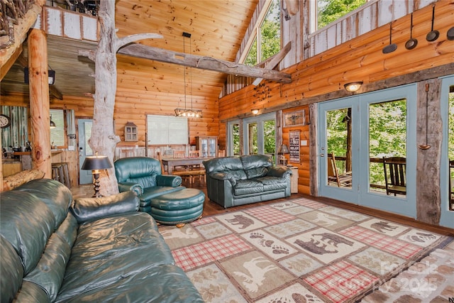 1145 Eagles Roost Rd, Bryson City, NC 28713 - living area with high vaulted ceiling, wooden ceiling, wood finished floors, and a chandelier