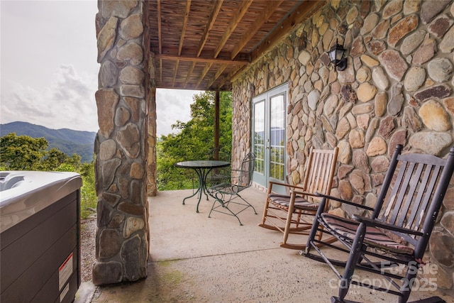 1145 Eagles Roost Rd, Bryson City, NC 28713 - view of patio featuring a mountain view and french doors