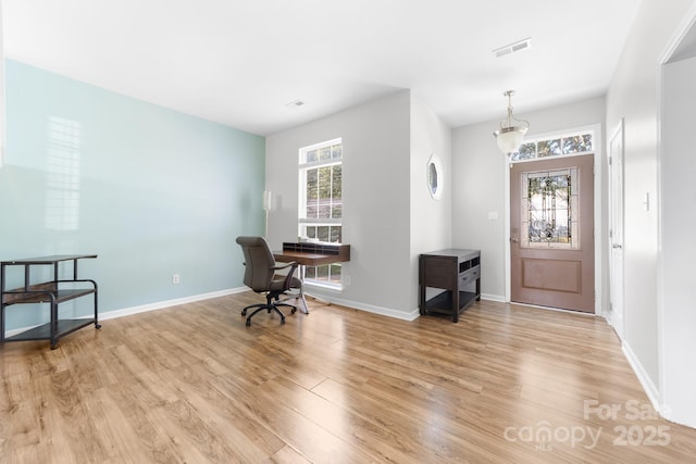 5104 Timbertop Ln, Charlotte, NC 28215 - entryway featuring light wood-style flooring and plenty of natural light