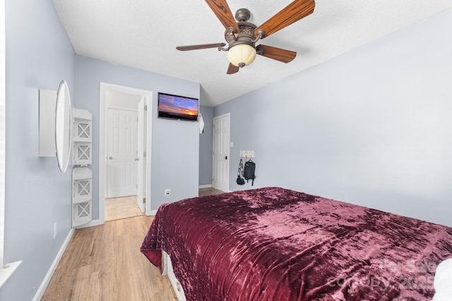 5104 Timbertop Ln, Charlotte, NC 28215 - bedroom with light wood-style flooring and ceiling fan