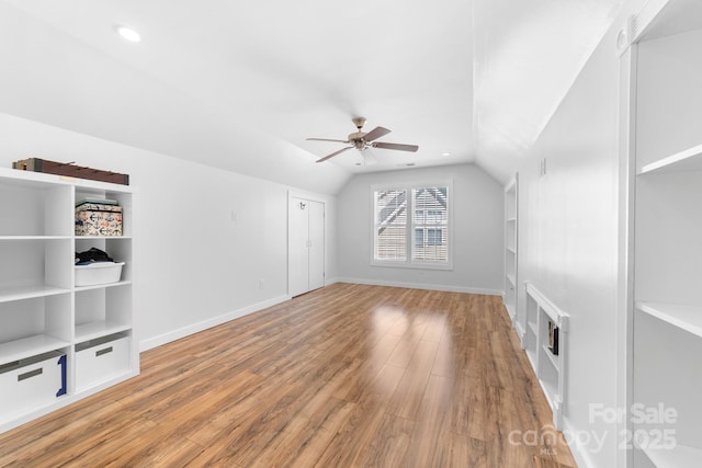 5104 Timbertop Ln, Charlotte, NC 28215 - bonus room with vaulted ceiling, ceiling fan, light wood-style flooring, and recessed lighting
