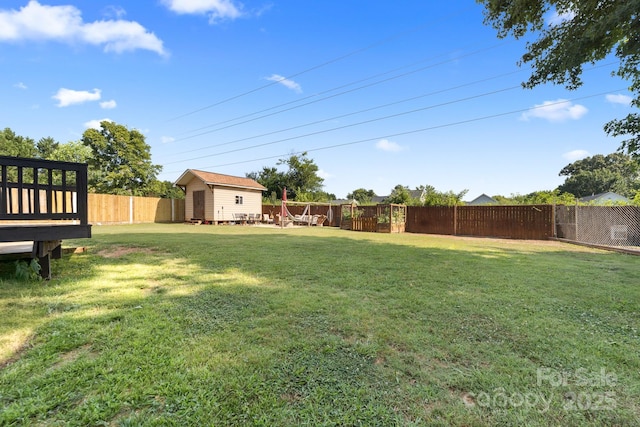 5104 Timbertop Ln, Charlotte, NC 28215 - fenced backyard featuring a storage shed and a wooden deck