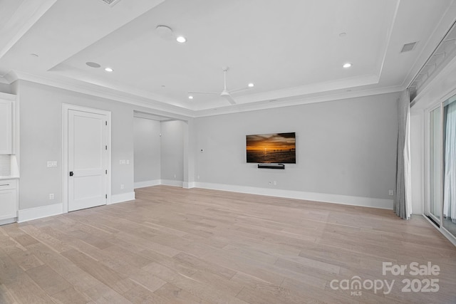 19329 Watermark Dr Unit 422, Cornelius, NC 28031 - unfurnished living room with a raised ceiling, a ceiling fan, light wood finished floors, recessed lighting, and ornamental molding