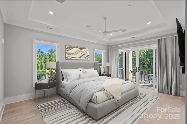 19329 Watermark Dr Unit 422, Cornelius, NC 28031 - bedroom with a tray ceiling, access to outside, light wood-style floors, recessed lighting, and ceiling fan
