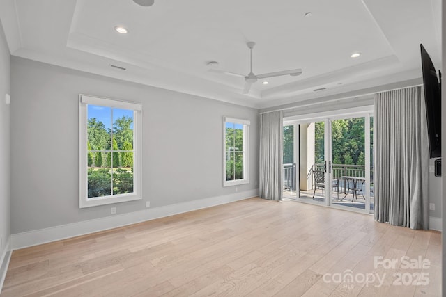 19329 Watermark Dr Unit 422, Cornelius, NC 28031 - empty room with a raised ceiling, light wood-style flooring, ceiling fan, and recessed lighting