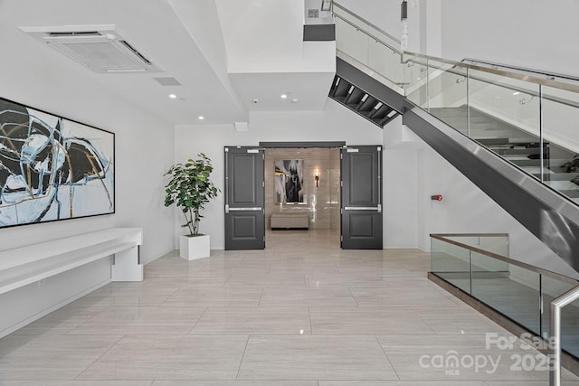 19329 Watermark Dr Unit 422, Cornelius, NC 28031 - common area with stairs, recessed lighting, and a high ceiling