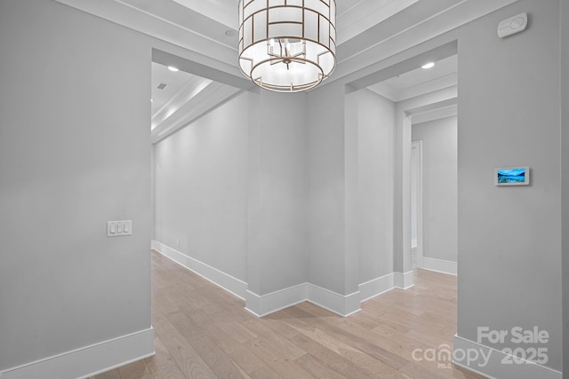 19329 Watermark Dr Unit 422, Cornelius, NC 28031 - hallway with wood finished floors and a chandelier