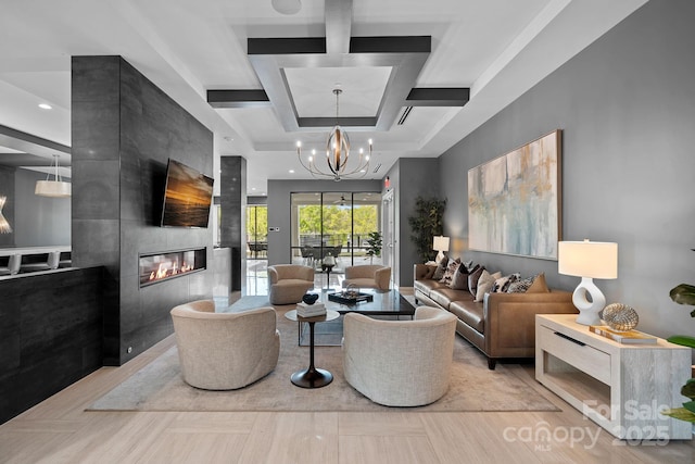 19329 Watermark Dr Unit 422, Cornelius, NC 28031 - living room featuring coffered ceiling, a large fireplace, a chandelier, and beam ceiling