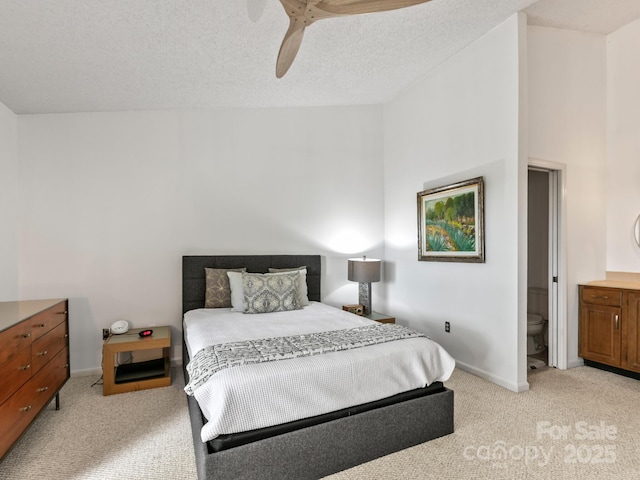 305 Piney Mountain Dr Unit B3, Asheville, NC 28805 - bedroom featuring light carpet, vaulted ceiling, a ceiling fan, a textured ceiling, and connected bathroom
