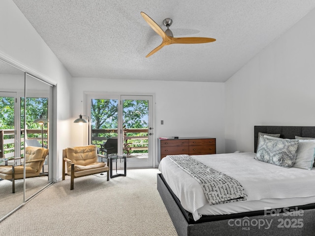 305 Piney Mountain Dr Unit B3, Asheville, NC 28805 - carpeted bedroom with access to exterior, a textured ceiling, ceiling fan, and lofted ceiling