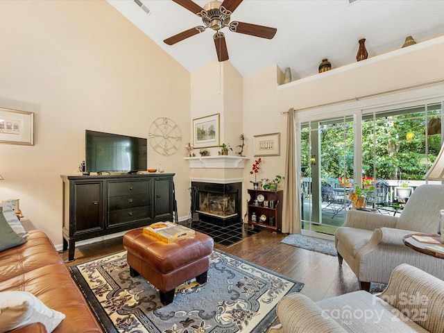 13600 Seastone Ln, Pineville, NC 28134 - living area with wood finished floors, a ceiling fan, high vaulted ceiling, and a fireplace with flush hearth