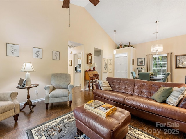 13600 Seastone Ln, Pineville, NC 28134 - living room with a chandelier, wood finished floors, ceiling fan, and high vaulted ceiling