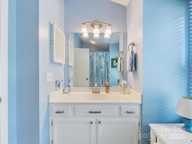13600 Seastone Ln, Pineville, NC 28134 - full bath featuring vanity and a chandelier