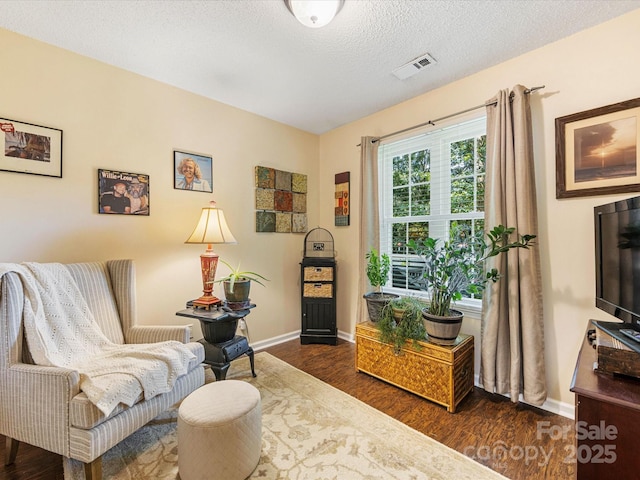 13600 Seastone Ln, Pineville, NC 28134 - sitting room with dark wood finished floors and a textured ceiling