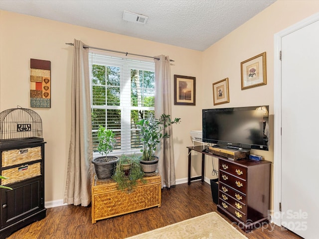 13600 Seastone Ln, Pineville, NC 28134 - home office featuring dark wood-style floors and a textured ceiling