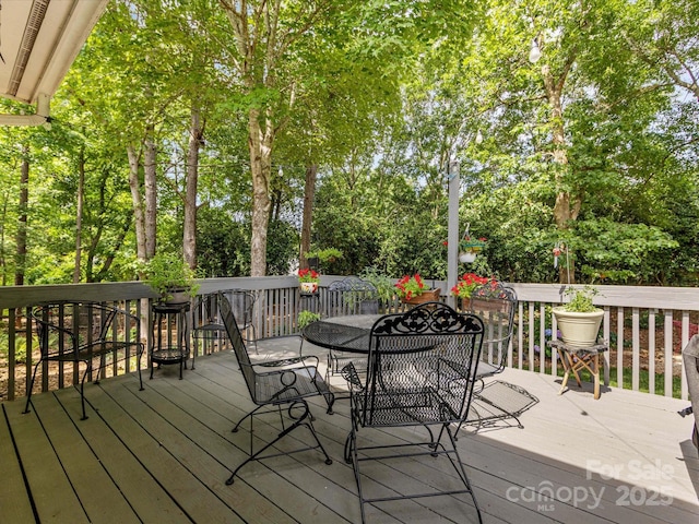 13600 Seastone Ln, Pineville, NC 28134 - deck featuring view of scattered trees and outdoor dining space