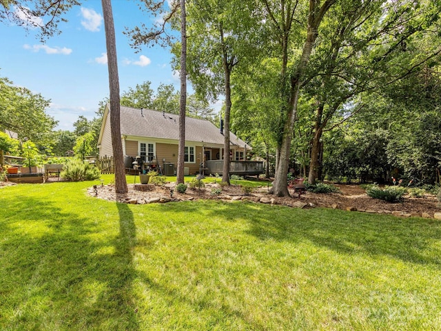 13600 Seastone Ln, Pineville, NC 28134 - rear view of property with a wooden deck and a yard