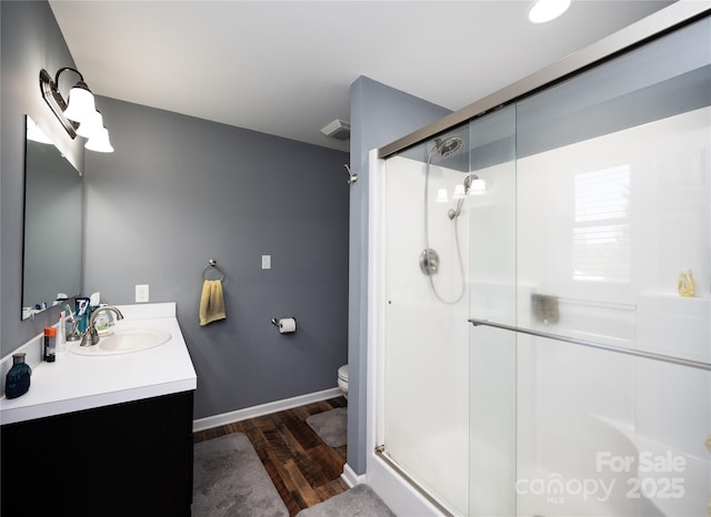 3330 Clinzo Feemster Rd, Hickory Grove, SC 29717 - bathroom with vanity, wood finished floors, and a stall shower