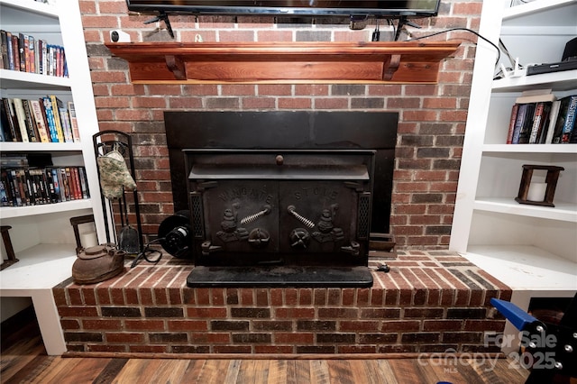 3330 Clinzo Feemster Rd, Hickory Grove, SC 29717 - detailed view of a brick fireplace and wood finished floors
