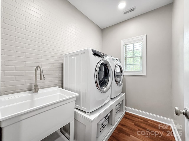 234 Rivercliff Dr, Stony Point, NC 28678 - washroom with washer and dryer and dark wood-style floors