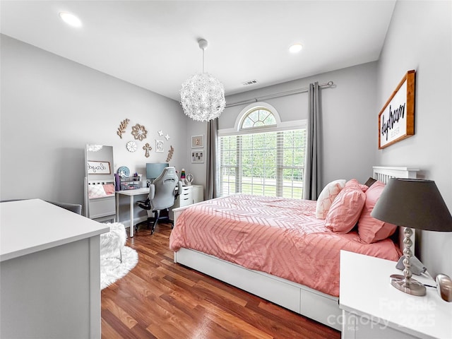 234 Rivercliff Dr, Stony Point, NC 28678 - bedroom featuring wood finished floors, an office area, a chandelier, and recessed lighting