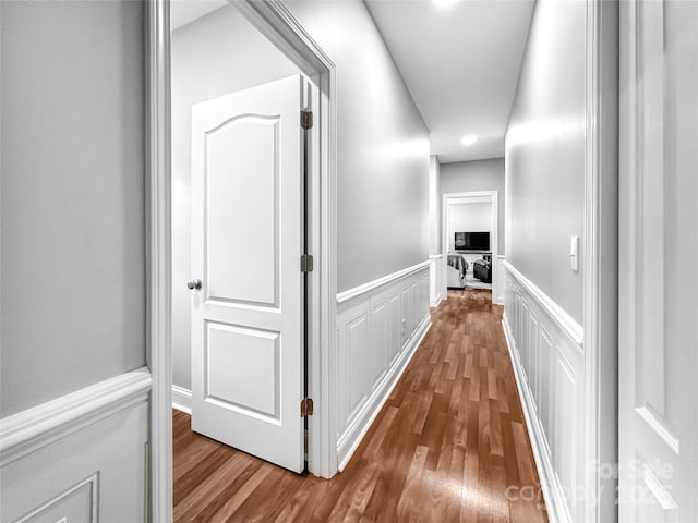 234 Rivercliff Dr, Stony Point, NC 28678 - hall featuring wood finished floors, a decorative wall, wainscoting, and recessed lighting