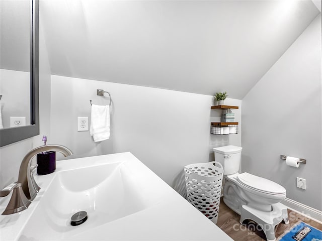 234 Rivercliff Dr, Stony Point, NC 28678 - half bathroom featuring lofted ceiling, wood finished floors, and vanity