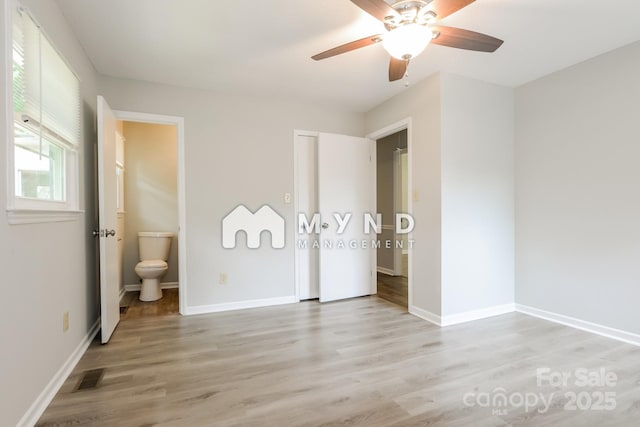 4308 Pinto Ln, Gastonia, NC 28052 - unfurnished bedroom featuring light wood-type flooring and connected bathroom