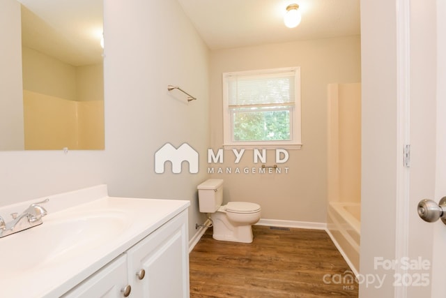 4308 Pinto Ln, Gastonia, NC 28052 - bathroom with vanity, wood finished floors, and shower / bath combination