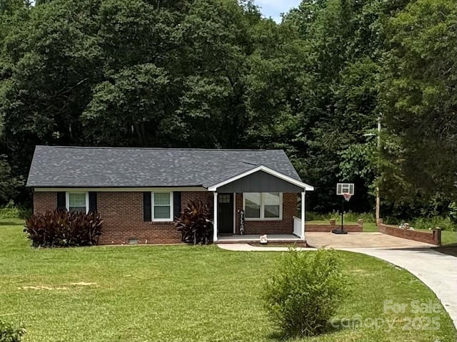 232 Harmony Hills Dr, Catawba, SC 29704 - single story home featuring driveway, brick siding, a front yard, and roof with shingles
