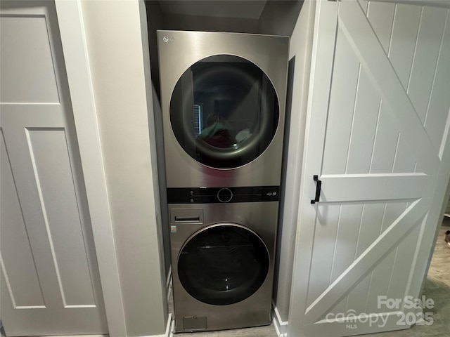 232 Harmony Hills Dr, Catawba, SC 29704 - laundry area featuring stacked washer and clothes dryer